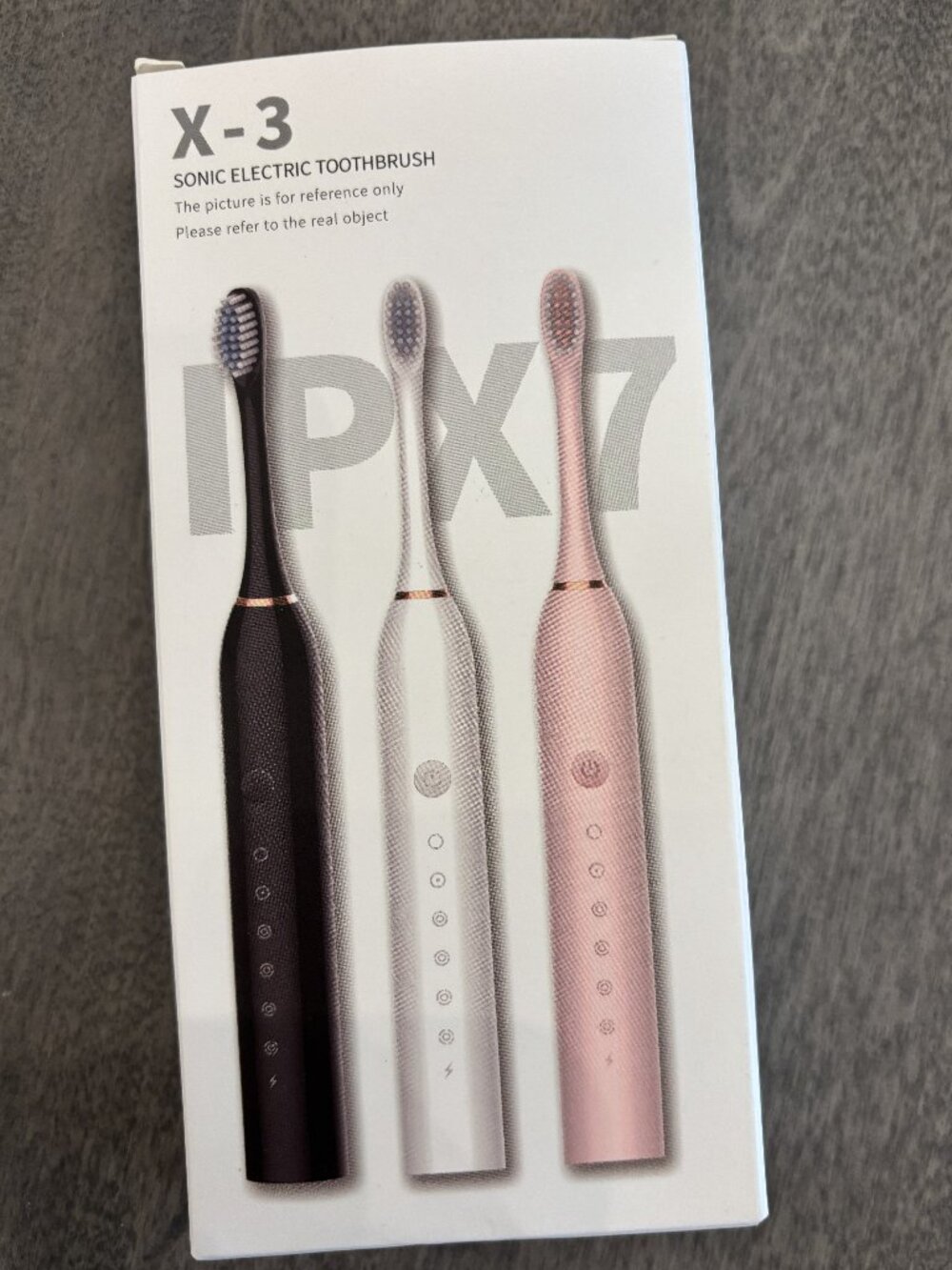 1 White travel electric toothbrush...NEW